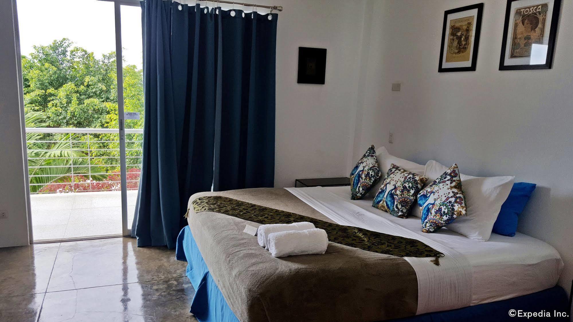 Paboreal Boutique Hotel Puerto Princesa Bagian luar foto