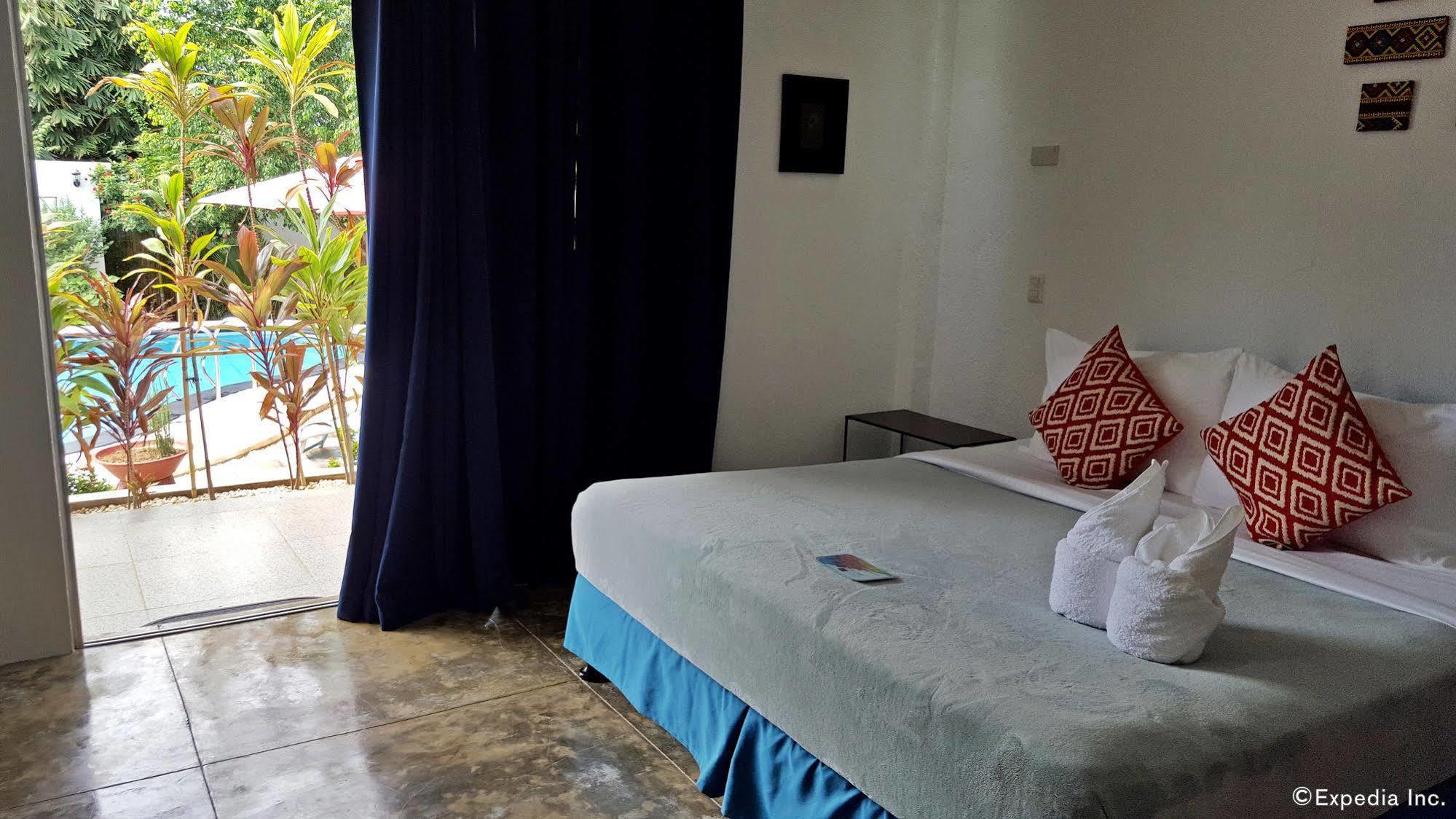 Paboreal Boutique Hotel Puerto Princesa Bagian luar foto